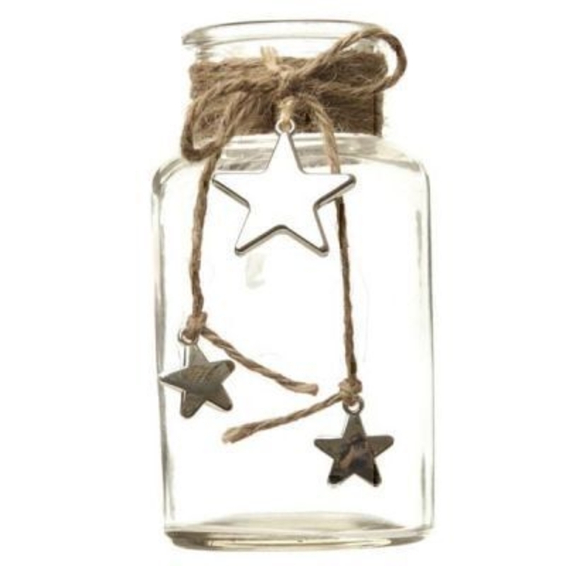 This Glass Jar with Hanging Stars by Heaven Sends is a lovely gift and could be used for a lot of purposes. This small glass jar features 3 metal stars hanging from twine around the neck of the jar. It could be used as a vase a pen pot on a desk or a toot